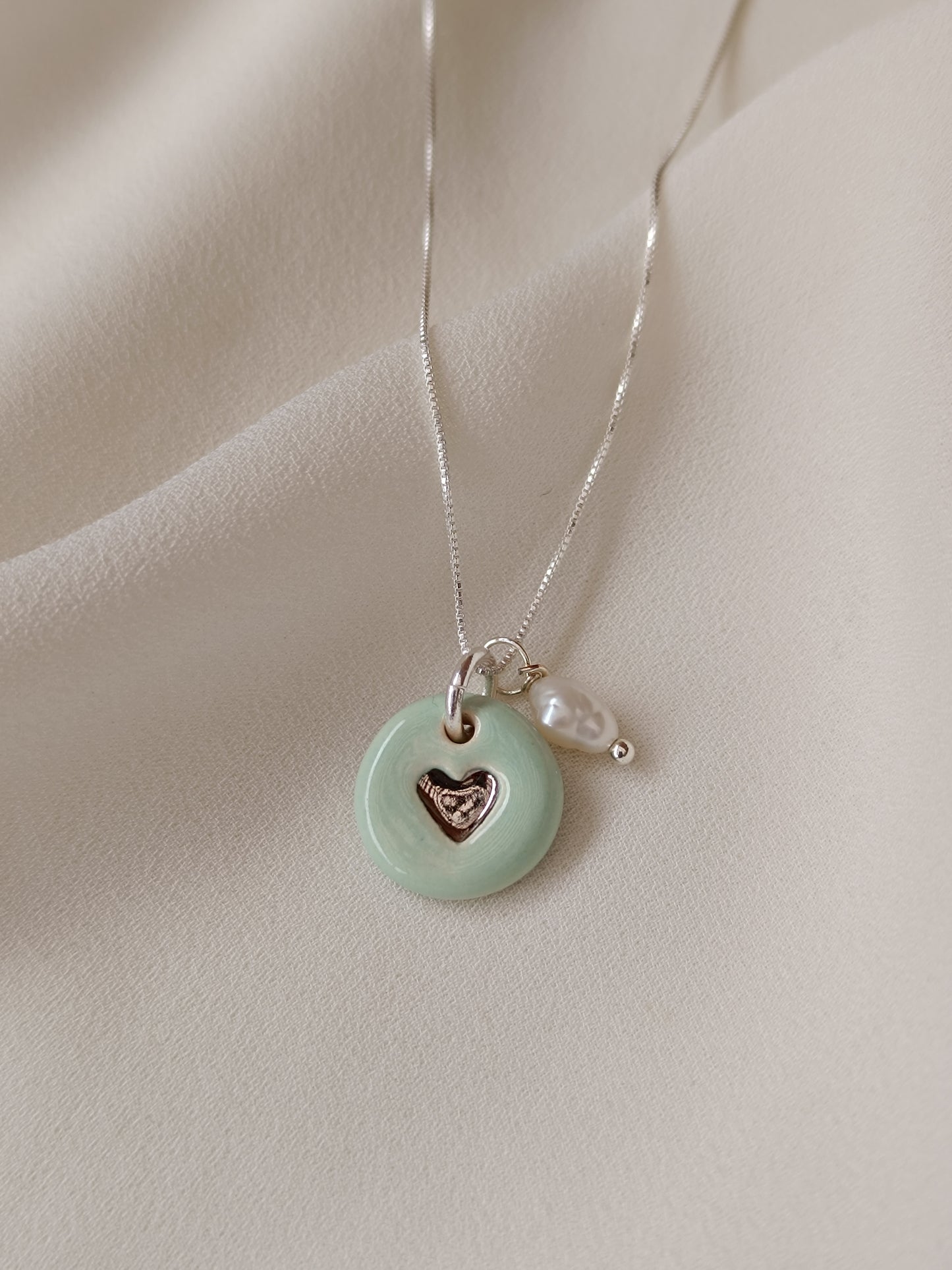 Dije corazón petit plata