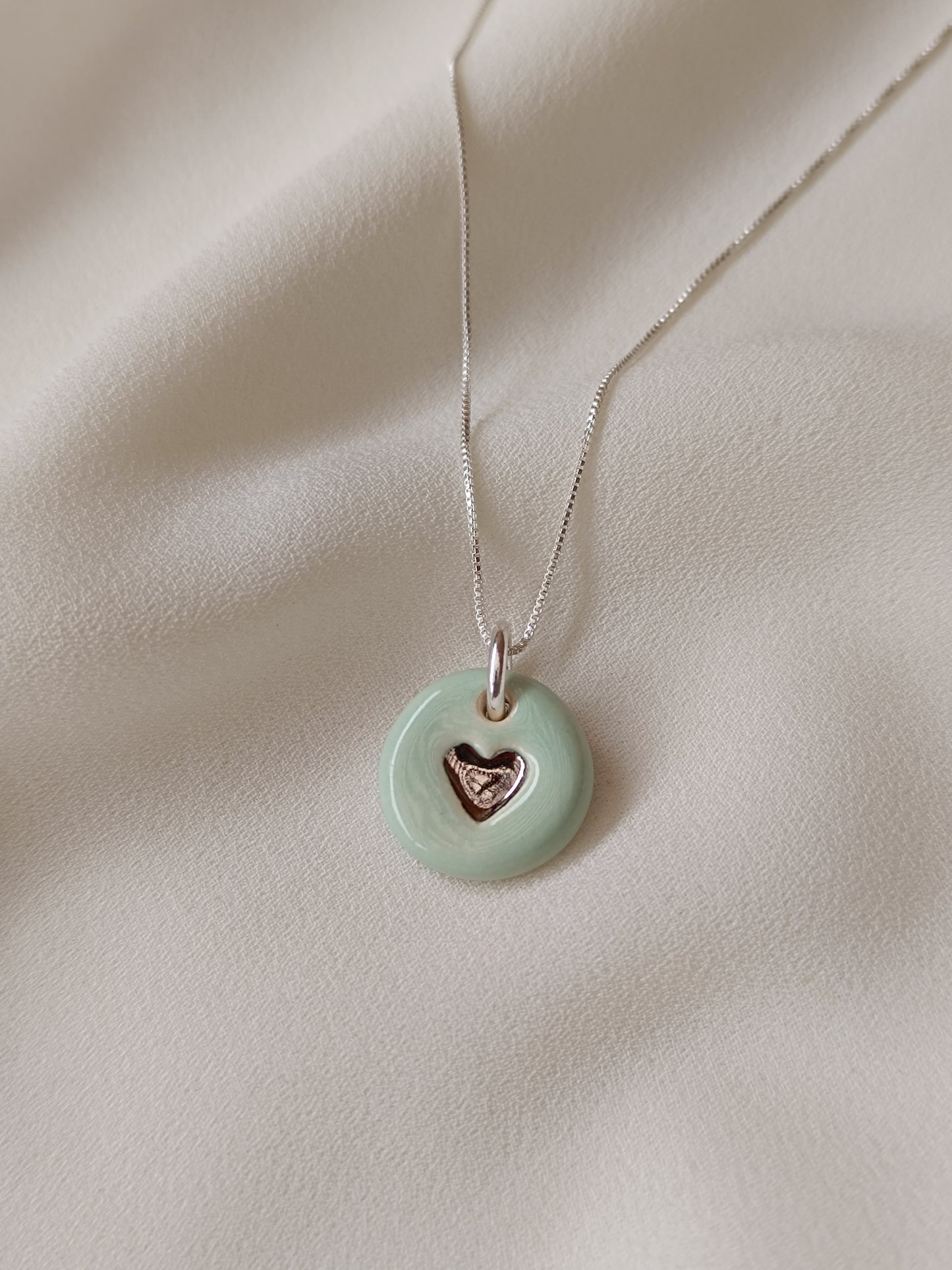 Dije corazón petit plata