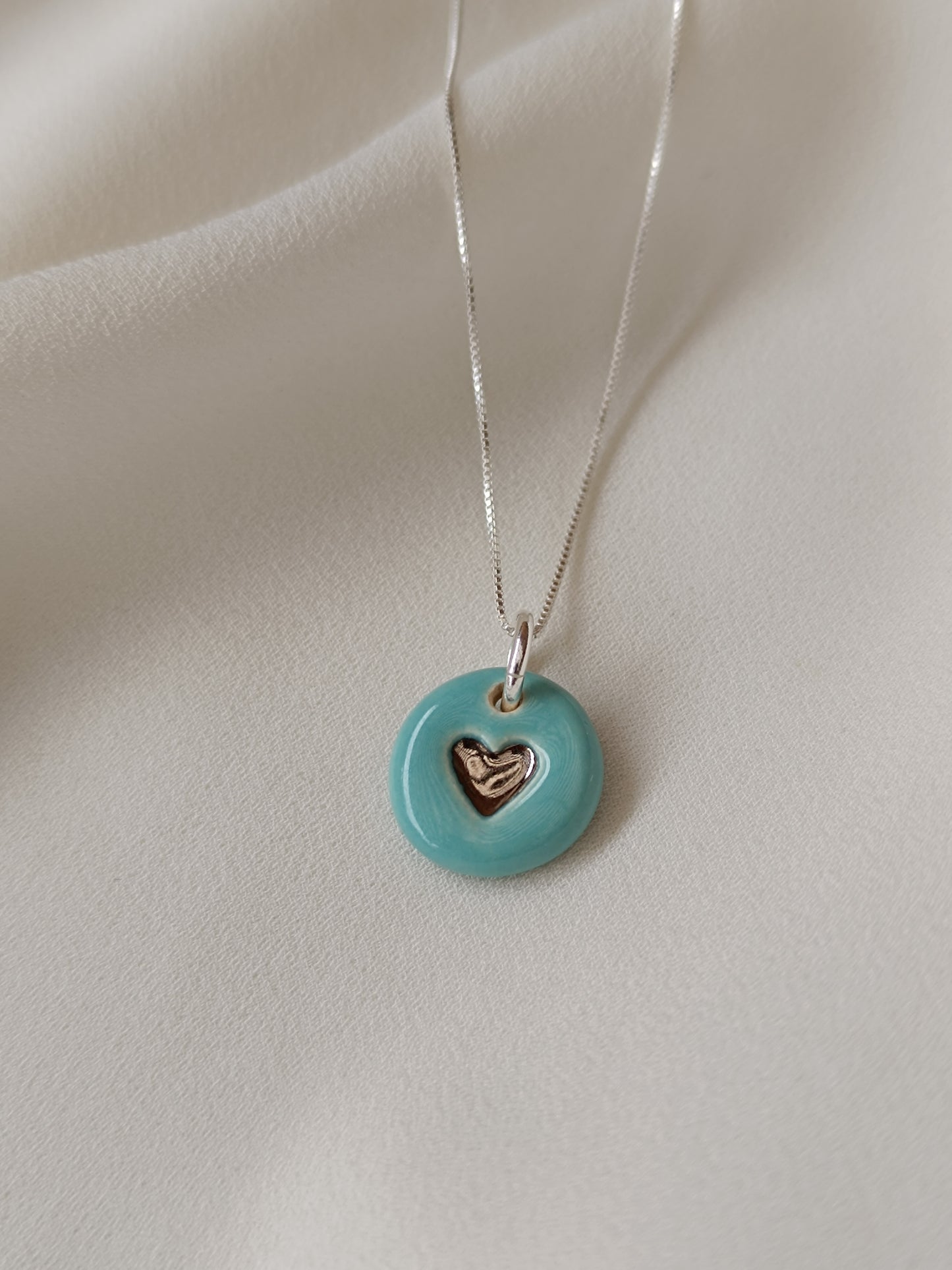 Dije corazón petit plata