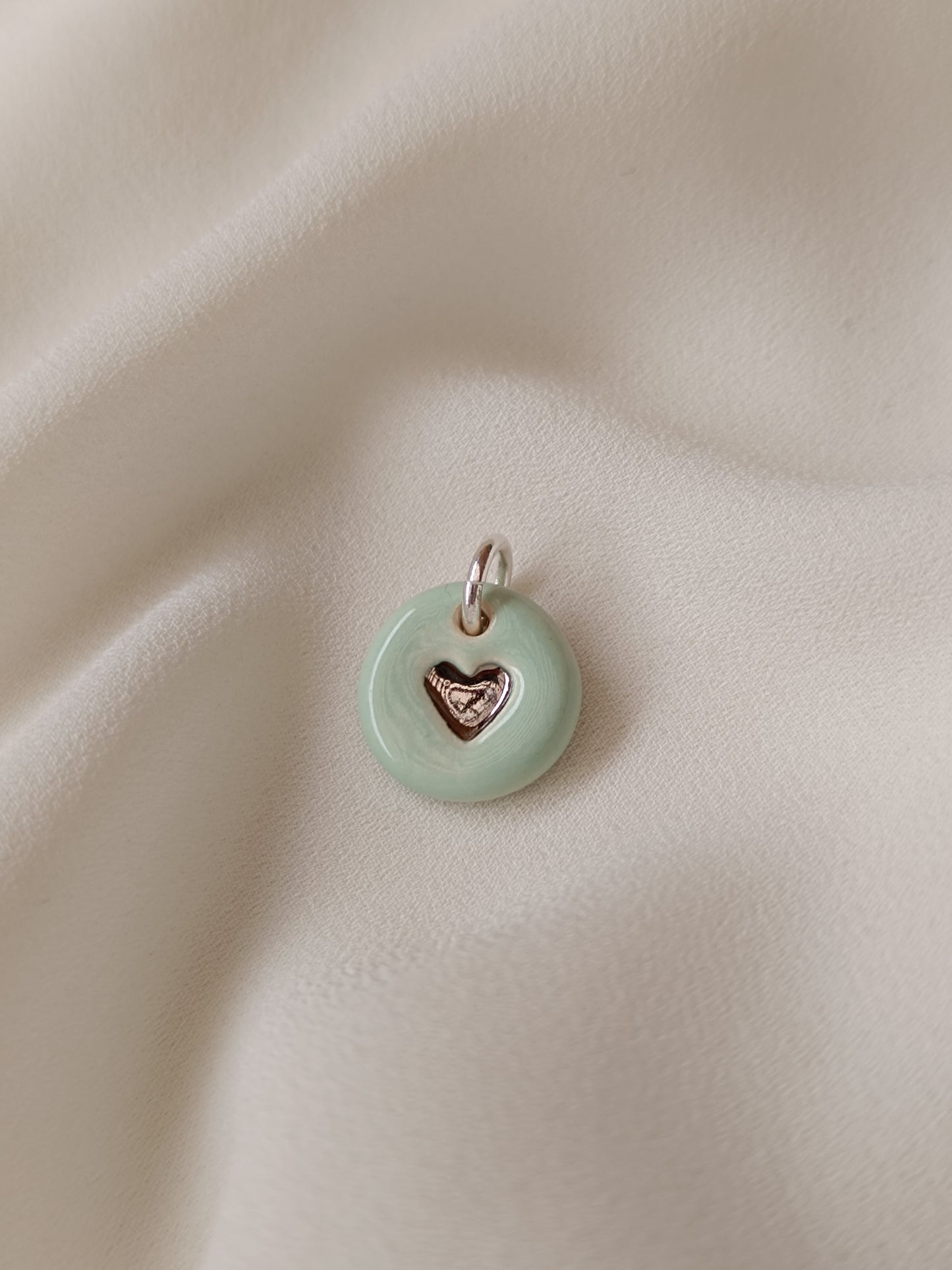 Dije corazón petit plata